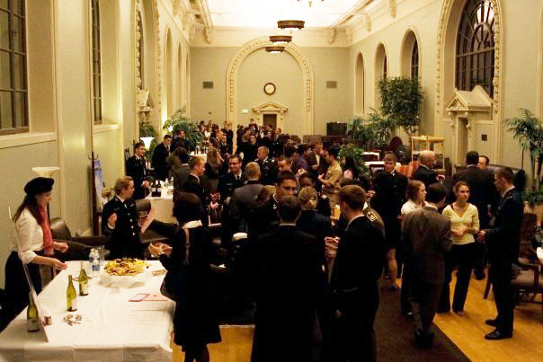 Crowd of students mingle after a conference